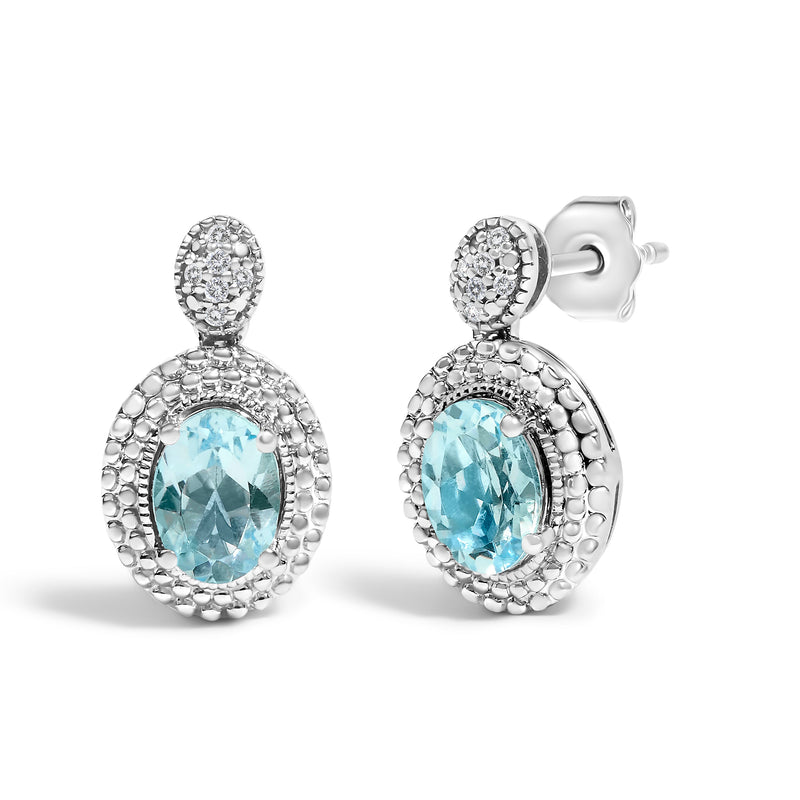 Bids.com .925 Sterling Silver Diamond Accent and  Oval Blue Topaz with Beaded Halo Drop Stud Earrings (I-J color, I1-I2 Clarity) Earrings White Smoke White.Sterling Silver / 0.044