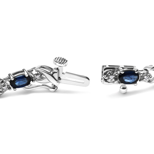 Bids.com 10K White Gold 5x4mm Oval Sapphire Gemstone and 1/10 Cttw Diamond Prong Set "X" Link Bracelet - Size 7" (H-I Color, SI1-SI2 Clarity) Bracelets White Smoke White.Gold / 7