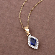 Bids.com 0.92 Carat Genuine Blue Sapphire and White Diamond 14K Yellow Gold Pendant Pendants Dim Gray