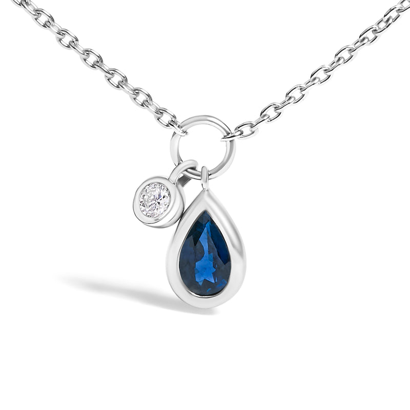Bids.com 10K White Gold 6x4 mm Pear Blue Sapphire and Diamond  Accent Charm Pendant Necklace - 18" Inches Necklaces White Smoke White.Gold / 18