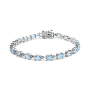 Bids.com .925 Sterling Silver 11.0 Cttw Oval Shaped Created Light Blue Topaz Link Bracelet - 7 inch Bracelets White Smoke White.Sterling Silver / 7