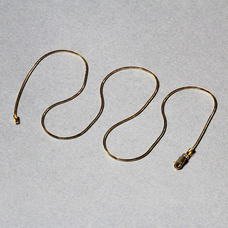 Bids.com 14k Yellow Gold Round Snake Chain 0.9mm Necklaces Gray 16 / Yellow Gold,18 / Yellow Gold,20 / Yellow Gold,24 / Yellow Gold,Default Title / Yellow Gold