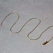 Bids.com 14k Yellow Gold Round Snake Chain 0.7mm Necklaces Dark Gray 16 / Yellow Gold,18 / Yellow Gold,20 / Yellow Gold,One / Yellow Gold