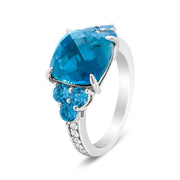 Bids.com 18K White Gold 10mm Cushion Shaped Blue Topaz and 1/6 Cttw Diamond 3 Stone Style Ring (F-G Color, VS1-VS2 Clarity) - Ring Size 6.5 Rings White Smoke 6.5 / White.Gold