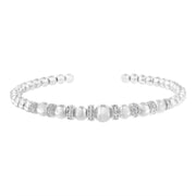 Bids.com .925 Sterling Silver 1/4 Cttw Diamond Rondelle Graduated Ball Bead Cuff Bangle Bracelet (I-J color, I2-I3 clarity) - Fits wrists up to 7 1/2 inches Bracelets White Smoke White.Sterling Silver / 7