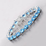 Bids.com 35.20 Carat Genuine Swiss Blue Topaz .925 Sterling Silver Bracelet Bracelets Gray size 7.00