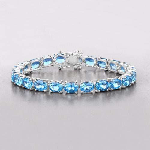 Bids.com 35.20 Carat Genuine Swiss Blue Topaz .925 Sterling Silver Bracelet Bracelets Gray size 7.00