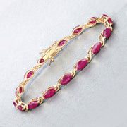Bids.com 8.00 Carat Genuine Ruby 10K Yellow Gold Bracelet Bracelets Light Gray size 7.00
