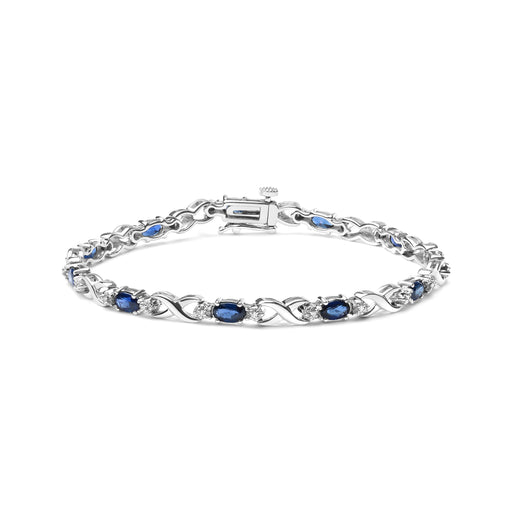 Bids.com 10K White Gold 5x4mm Oval Sapphire Gemstone and 1/10 Cttw Diamond Prong Set "X" Link Bracelet - Size 7" (H-I Color, SI1-SI2 Clarity) Bracelets White Smoke White.Gold / 7