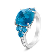 Bids.com 18K White Gold 10mm Cushion Shaped Blue Topaz and 1/6 Cttw Diamond 3 Stone Style Ring (F-G Color, VS1-VS2 Clarity) - Ring Size 6.5 Rings White Smoke 6.5 / White.Gold