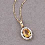 Bids.com 1.78 Carat Genuine Yellow Sapphire and White Diamond 14K Yellow Gold Pendant Pendants Rosy Brown
