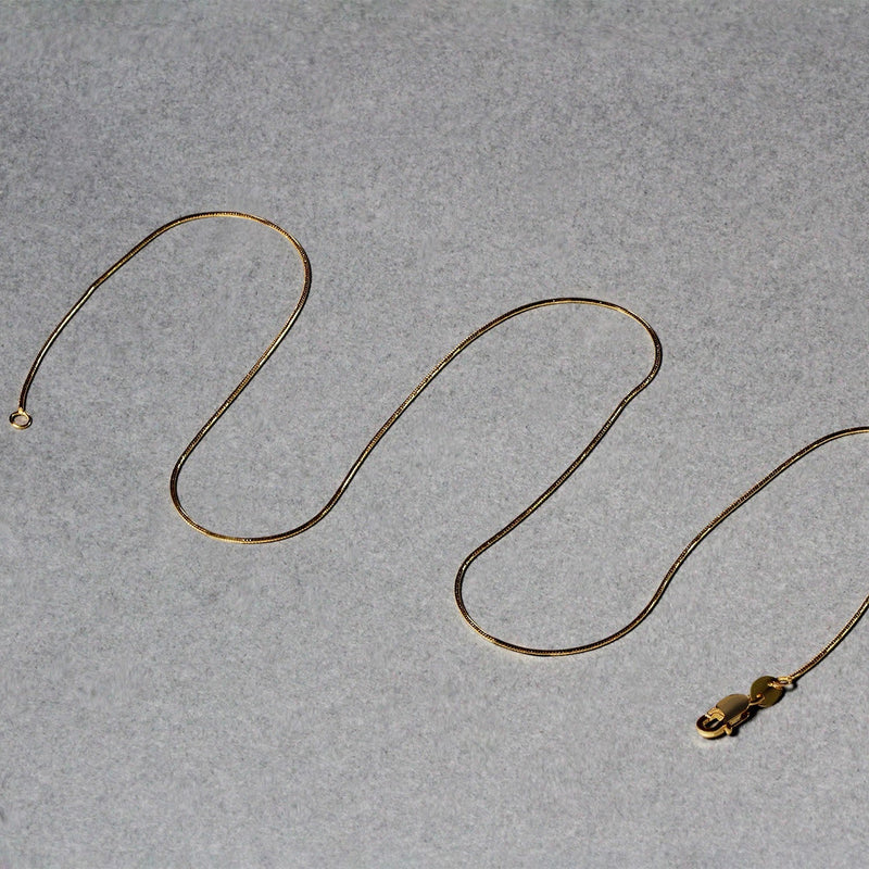 Bids.com 14k Yellow Gold Round Snake Chain 0.7mm Necklaces Dark Gray 16 / Yellow Gold,18 / Yellow Gold,20 / Yellow Gold,One / Yellow Gold