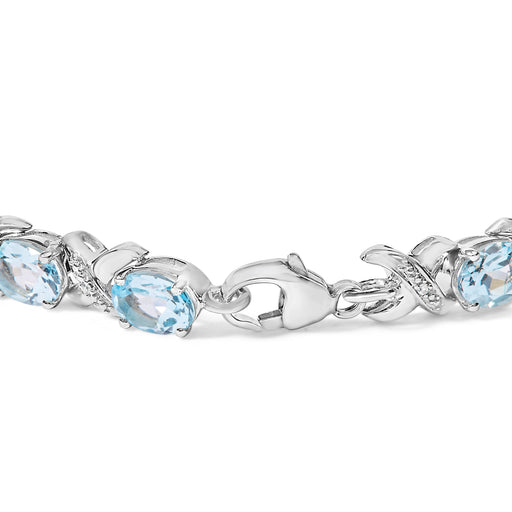 Bids.com .925 Sterling Silver 16.0 Cttw Oval Blue Topaz and Diamond Accent Tennis X Link Bracelet (I-J Color, I1-I2 Clarity) - Size 7" Inch Bracelets White Smoke White.Sterling Silver / 7