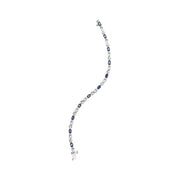 Bids.com 10K White Gold 5x4mm Oval Sapphire Gemstone and 1/10 Cttw Diamond Prong Set "X" Link Bracelet - Size 7" (H-I Color, SI1-SI2 Clarity) Bracelets White Smoke White.Gold / 7