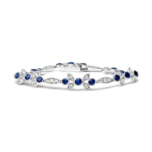 Bids.com 18K White Gold 1 3/4 Cttw Diamond and 3x3mm Round Blue Sapphire Gemstone Floral Link Bracelet (G-H Color, SI1-SI2 Clarity) - Size 7" Bracelets White Smoke White.Gold / 7