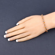 Bids.com 16.73 Carat Genuine Orange Sapphire and White Diamond 14K White Gold Bracelet Bracelets Dim Gray size 7.00