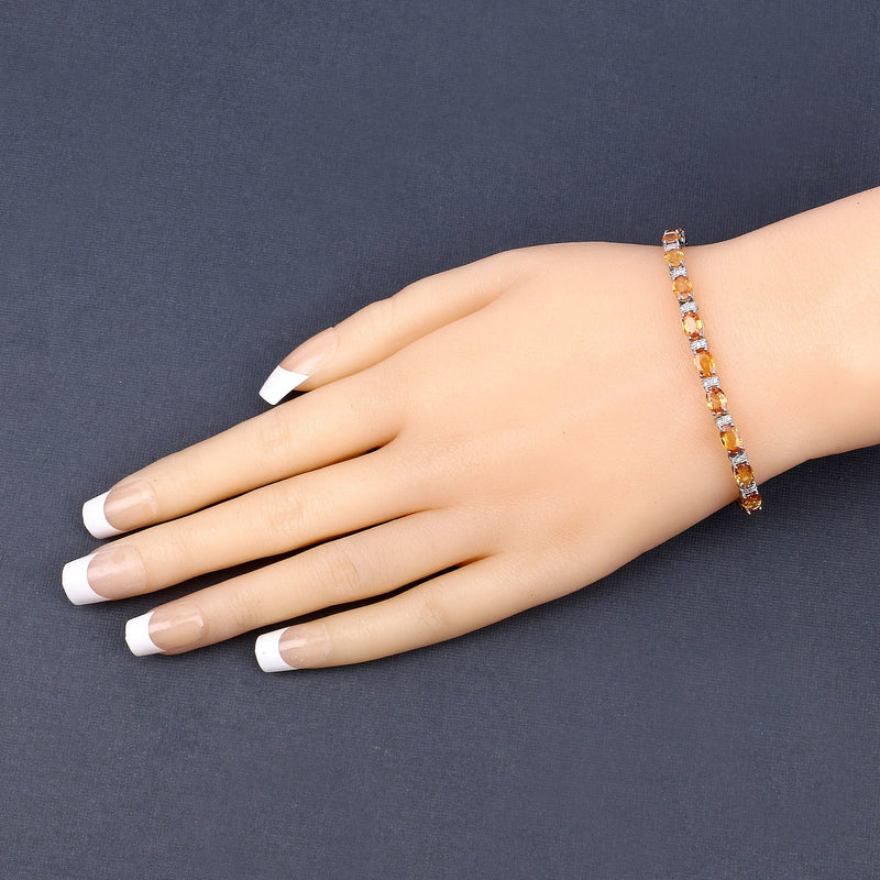 Bids.com 16.73 Carat Genuine Orange Sapphire and White Diamond 14K White Gold Bracelet Bracelets Dim Gray size 7.00