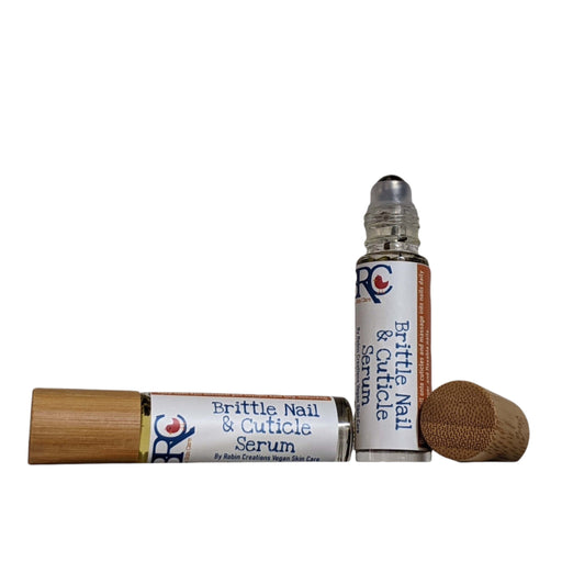 By Robin Creations Brittle Nail & Cuticle Serum Roller Ball Cuticle Cream & Oil Dark Gray 1  Bottle