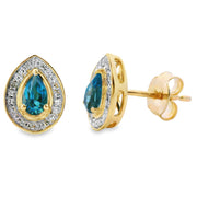 Bids.com .57ct London Blue Topaz Stud Earrings 10KT Yellow Gold Earrings White Smoke