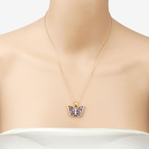 Bids.com 1.75 Carat Genuine Tanzanite and White Zircon .925 Sterling Silver Pendant Pendants Bisque