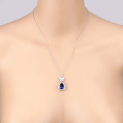 Bids.com 5.54 Carat Genuine Tanzanite and White Diamond 18K White Gold Pendant Pendants Peach Puff