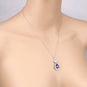 Bids.com 5.54 Carat Genuine Tanzanite and White Diamond 18K White Gold Pendant Pendants Peach Puff