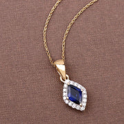 Bids.com 0.92 Carat Genuine Blue Sapphire and White Diamond 14K Yellow Gold Pendant Pendants Dim Gray