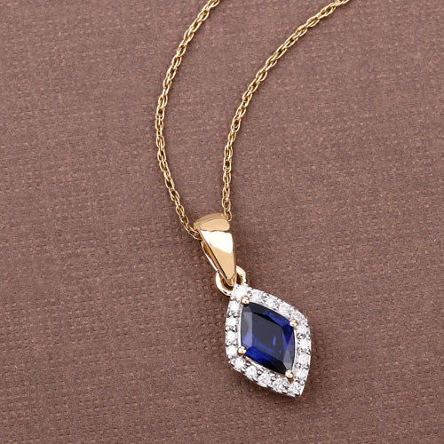 Bids.com 0.92 Carat Genuine Blue Sapphire and White Diamond 14K Yellow Gold Pendant Pendants Dim Gray