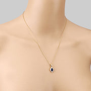 Bids.com 0.92 Carat Genuine Blue Sapphire and White Diamond 14K Yellow Gold Pendant Pendants Wheat