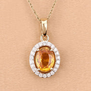 Bids.com 1.78 Carat Genuine Yellow Sapphire and White Diamond 14K Yellow Gold Pendant Pendants Tan