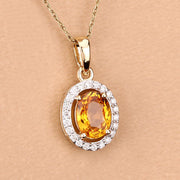 Bids.com 1.78 Carat Genuine Yellow Sapphire and White Diamond 14K Yellow Gold Pendant Pendants Tan