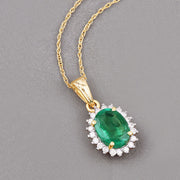 Bids.com 1.36 Carat Genuine Zambian Emerald and White Diamond 10K Yellow Gold Pendant Pendants Dark Gray