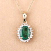 Bids.com 1.36 Carat Genuine Zambian Emerald and White Diamond 10K Yellow Gold Pendant Pendants Peach Puff
