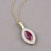 Bids.com 1.52 Carat Genuine Ruby and White Diamond 10K Yellow Gold Pendant Pendants Dark Gray