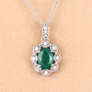 Bids.com 0.79 Carat Genuine Zambian Emerald and White Diamond 10K White Gold Pendant Pendants Navajo White
