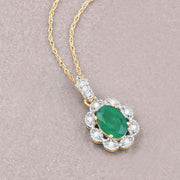 Bids.com 0.79 Carat Genuine Zambian Emerald and White Diamond 10K Yellow Gold Pendant Pendants Gray