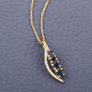 Bids.com 0.40 Carat Genuine Blue Sapphire and White Diamond 14K Yellow Gold Pendant Pendants Slate Gray